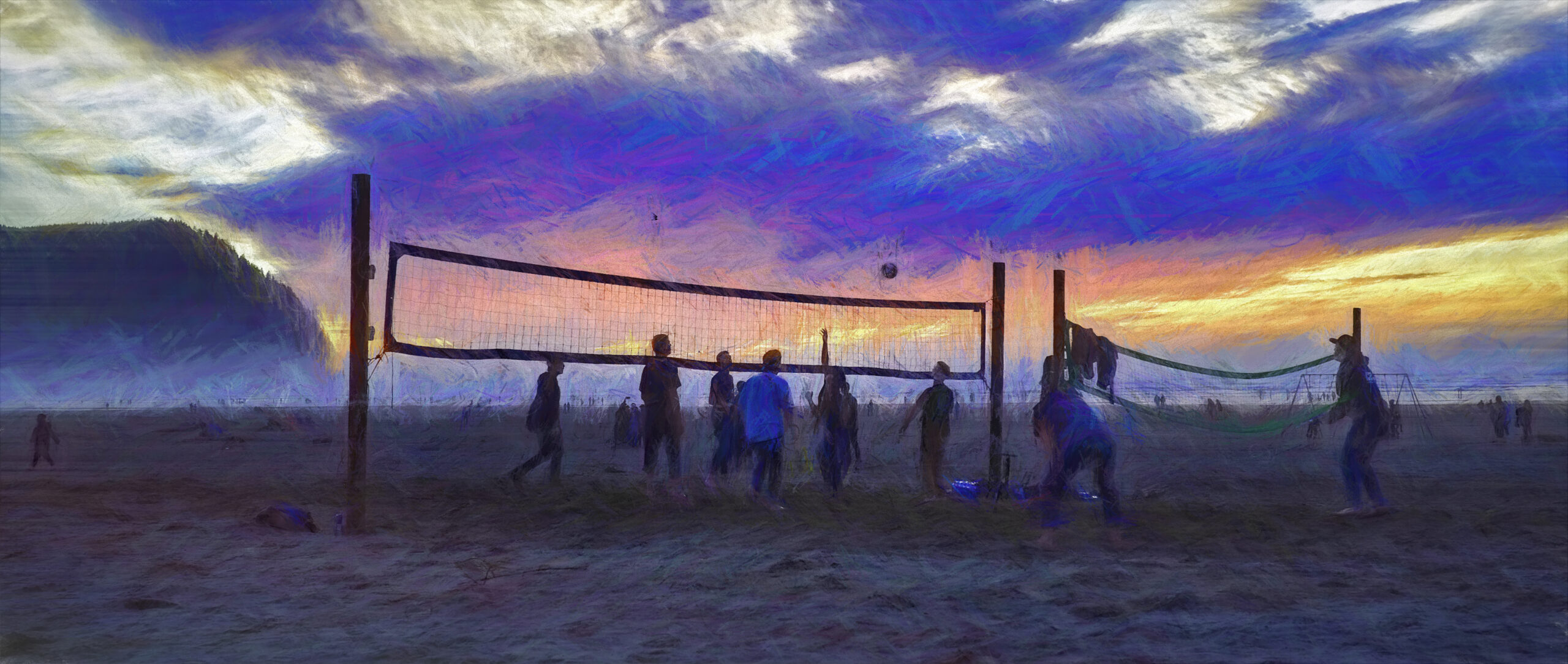 Playing volleyball on the beach at sunset