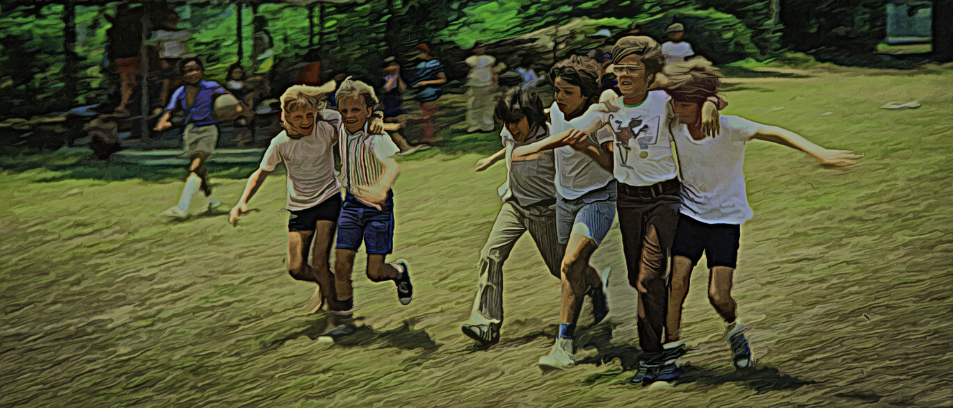 Boys running a three-legged race in the Dominican Republic
