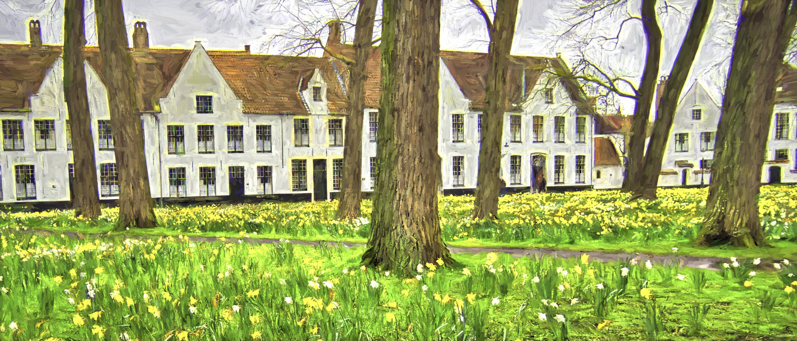 Daffodils bloom below the trees at an old convent in Bruges, Belgium