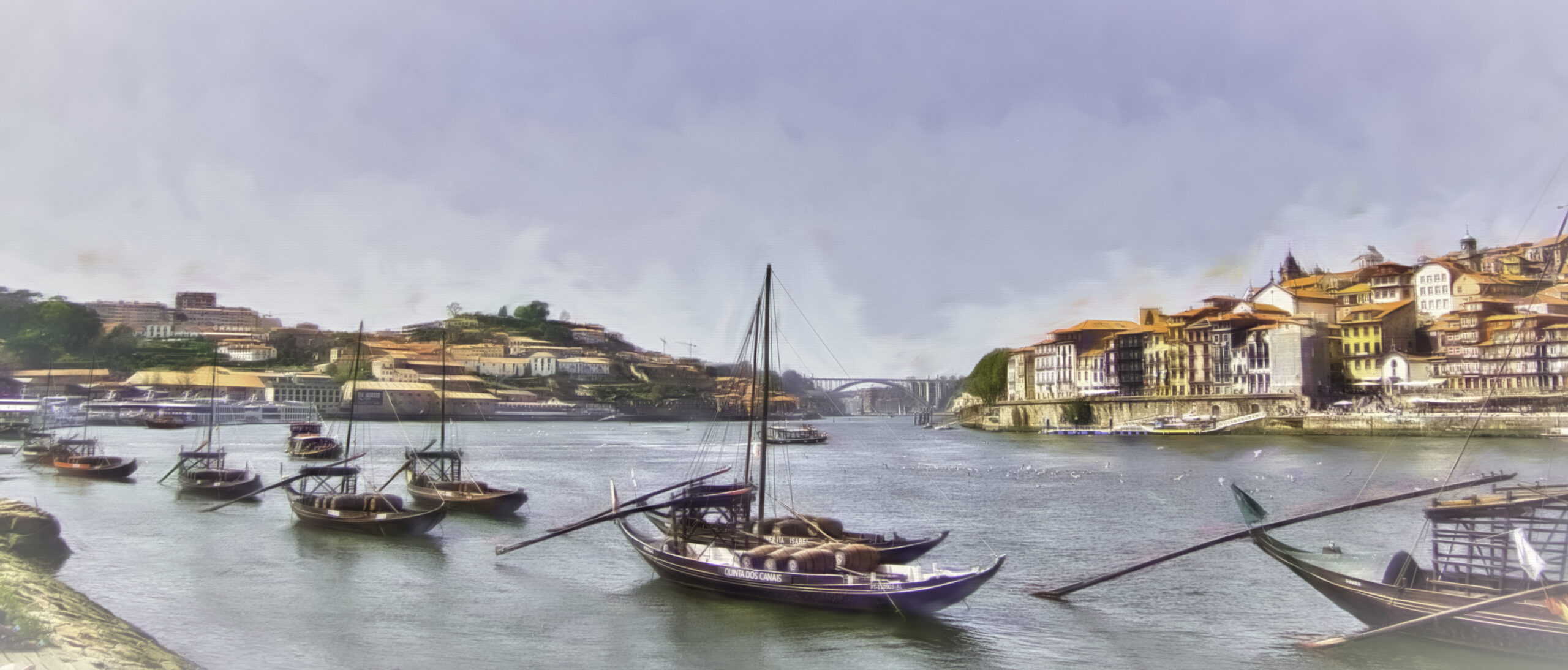 Boats in the Douro River looking towards Porto, Portugal