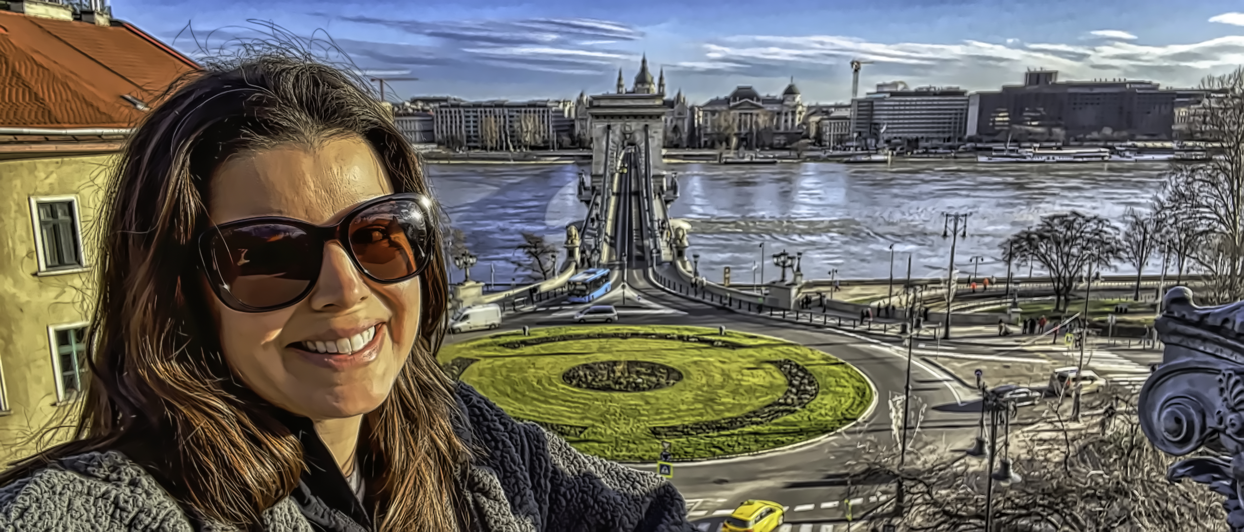 Selfie of woman with Budapest's Chain Bridge in the background