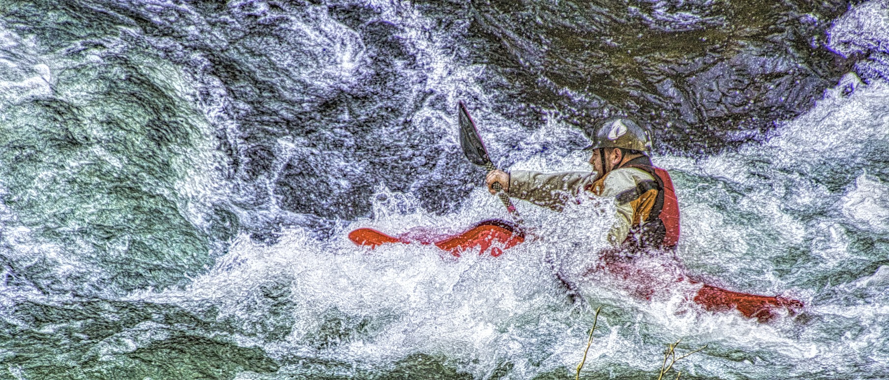 Man in kayak trying to paddle up stream