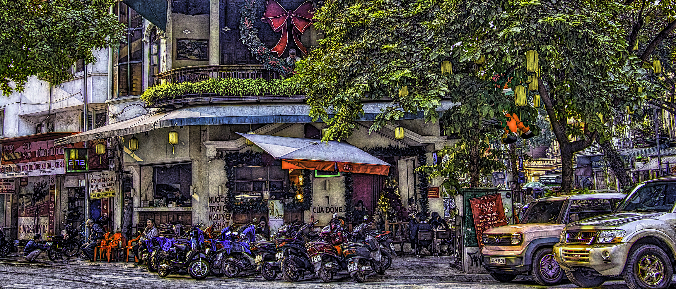 Scooters in front of a building in Hanoi, Vietnam