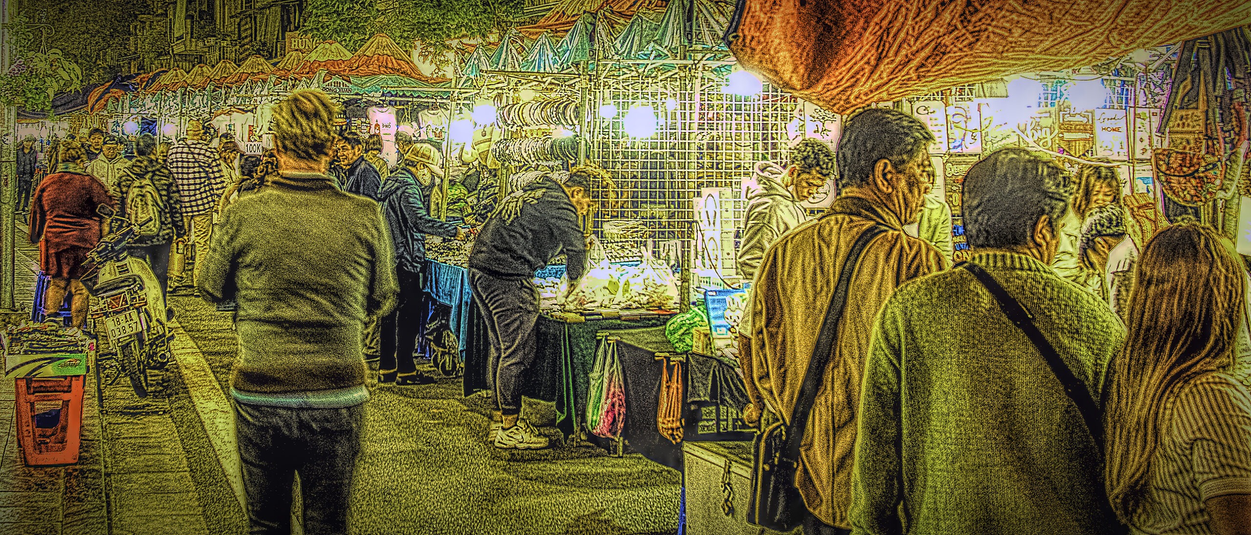 People shopping at the night market in Hanoi, Vietnam