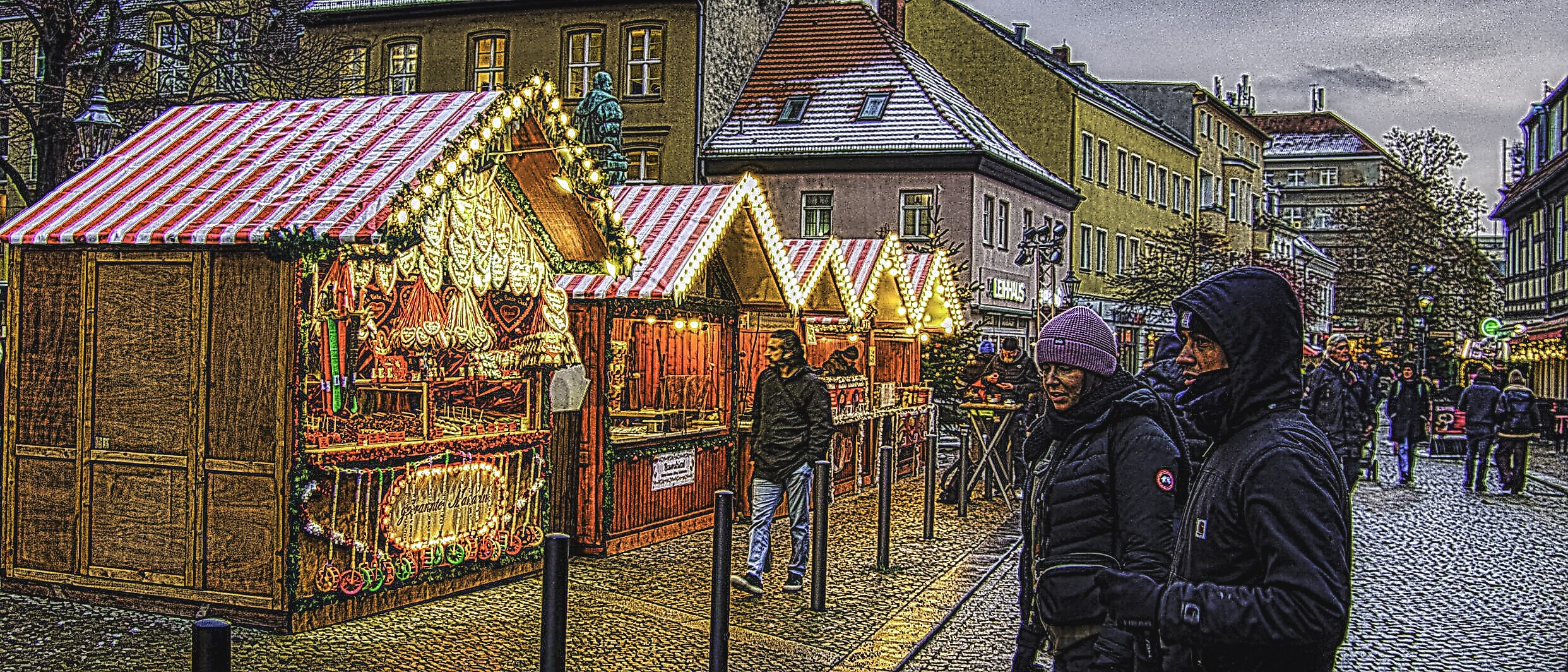 People at a Christmas market in Berlin, Germany