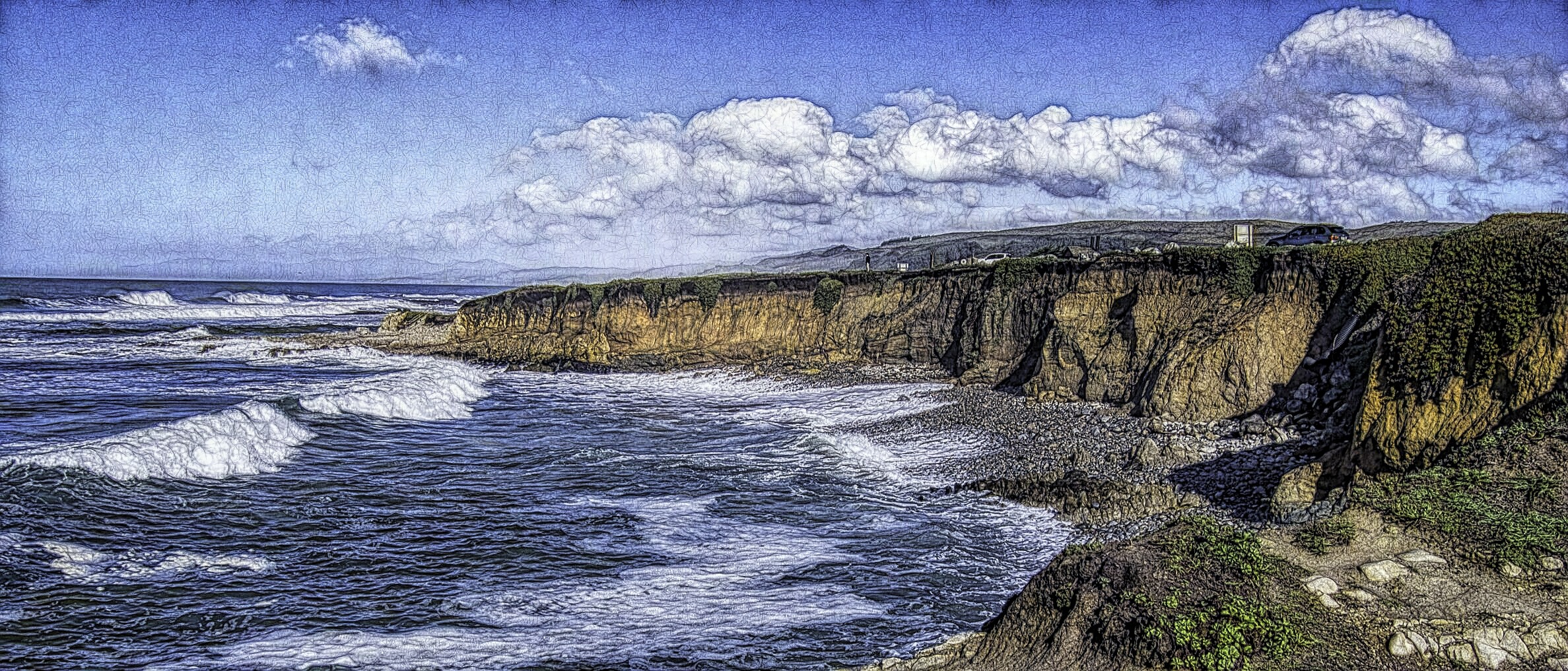The waves coming into a rocky beach on the California coast