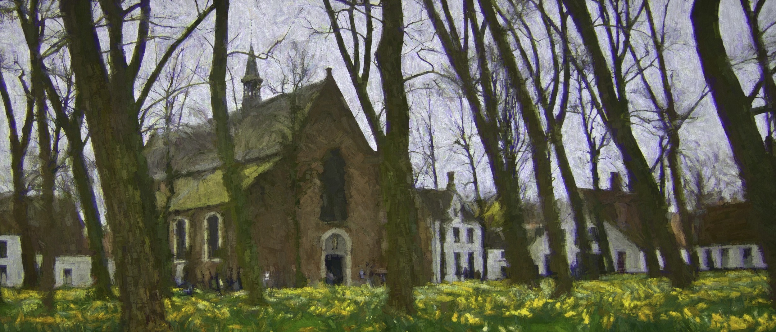 Church through the trees in Brugges, Belgium
