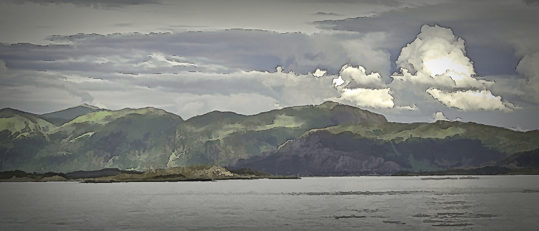 Passing a mountain range on the Norwegian coastline.