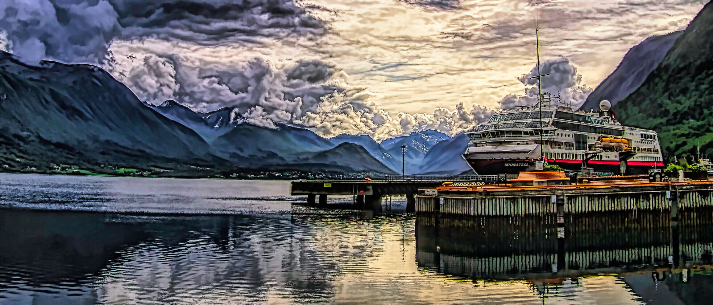 Looking toward the end of fjord past a docked cruise ship